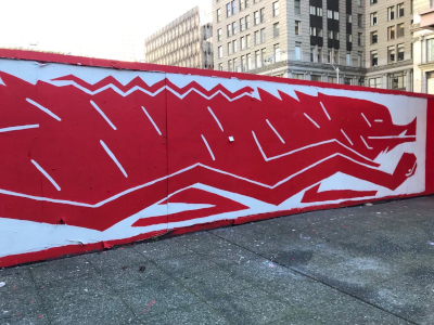 photo credit: madi (my one red bean), photograph of the long red and white street-art beast down on third ave